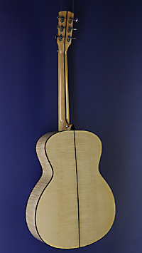 You&grave;s, glossy finished Acoustic Guitar in Grand Auditorium shape with solid spruce top and maple on back and sides, with pickup, back view