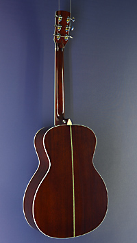 You&grave;s, sunburst finished Acoustic Guitar in OM shape with solid spruce top and mahogany on back and sides, with pickup, back view
