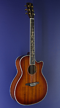 You&grave;s, glossy finished Acoustic Guitar in Grand Auditorium shape with solid koa top and koa on back and sides, with pickup